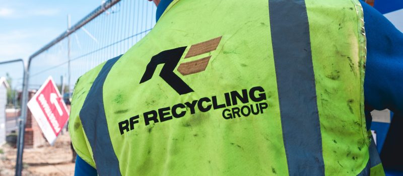 rf recycling logo on high visibility vest